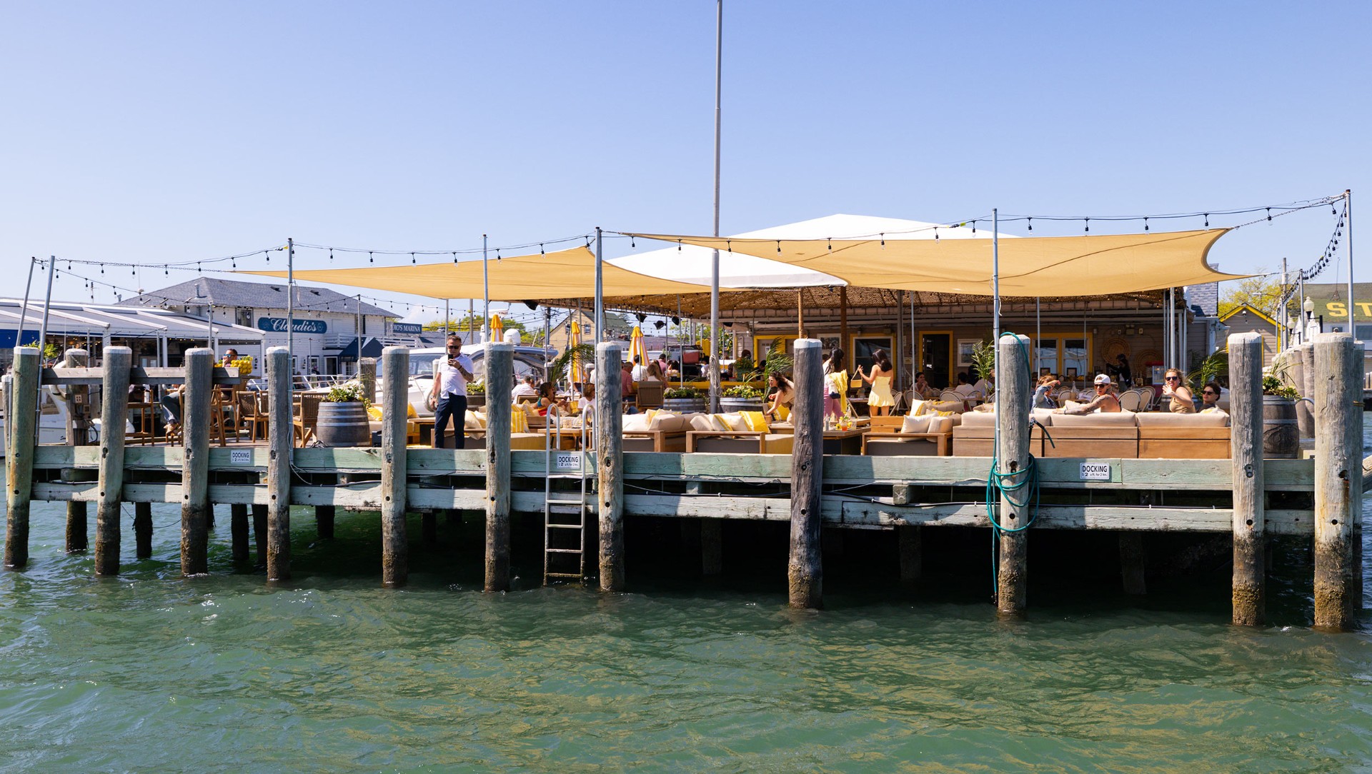 Saylor Beach House dockside lounge at Claudio's Marina