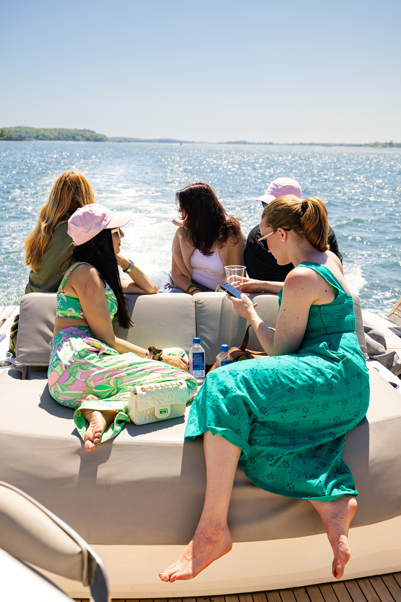 Guests relaxing on the yacht deck on the Peconic Bay